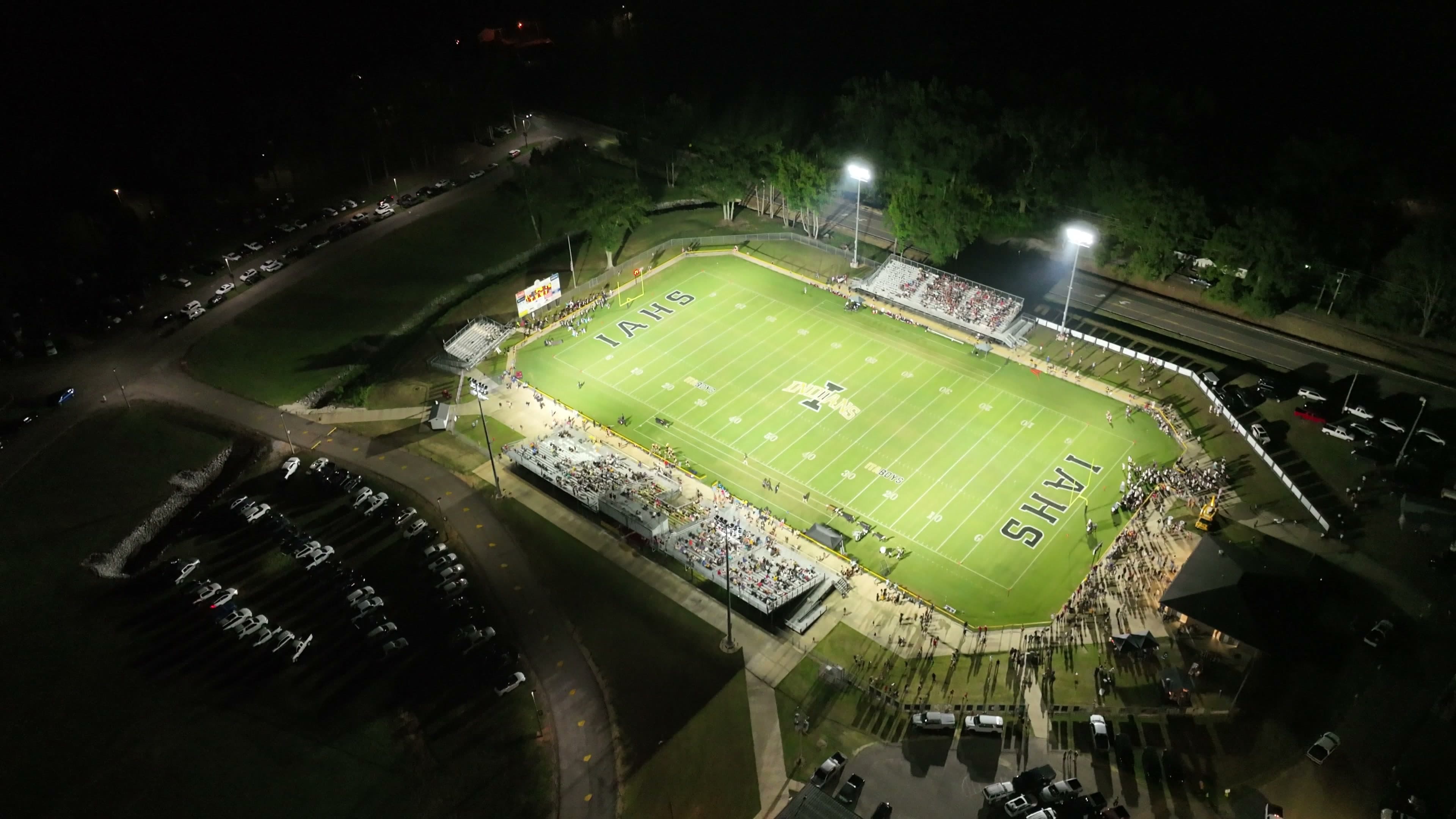 Aerial night view of the Itawamba AHS football field during an NMSN game