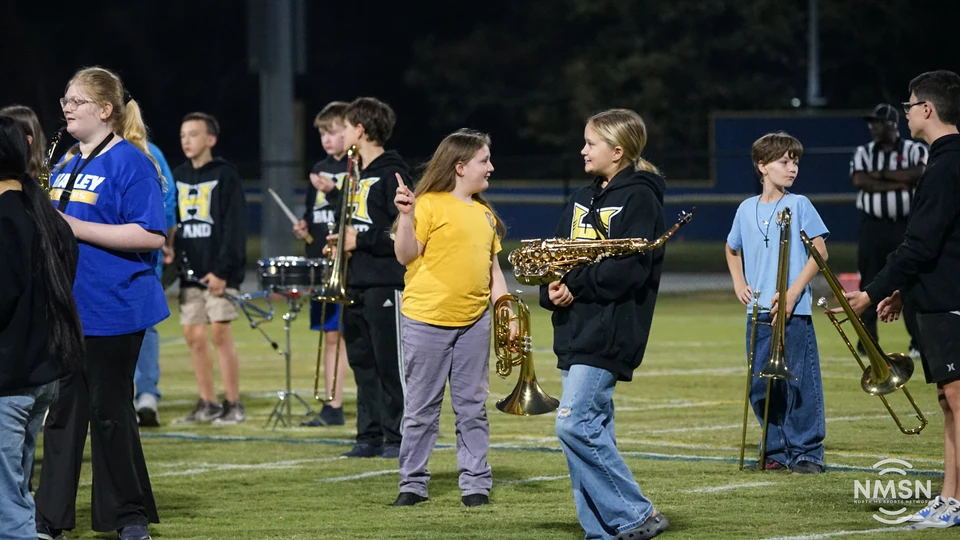 Young band members gather on the field — Hamilton at Hatley, October 30, 2026. Photo: NMSN.