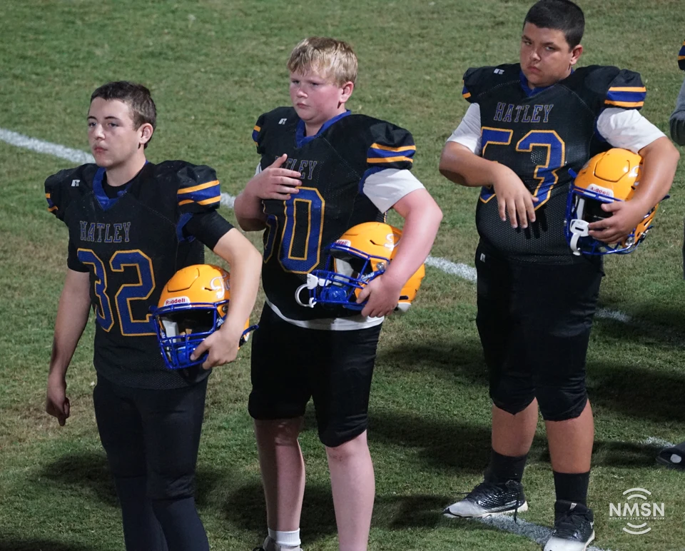 Hatley players during the national anthem — Hamilton at Hatley, October 30, 2026. Photo: NMSN.