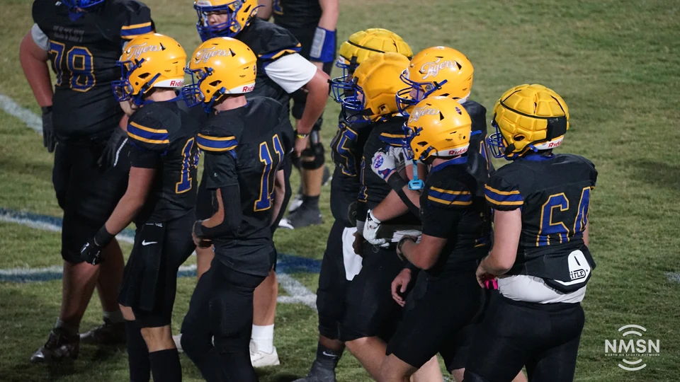 Hatley players gather in an offensive huddle — Hamilton at Hatley, October 30, 2026. Photo: NMSN.