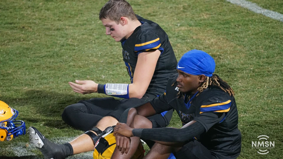 Hatley teammates sit together during a break — Hamilton at Hatley, October 30, 2026. Photo: NMSN.