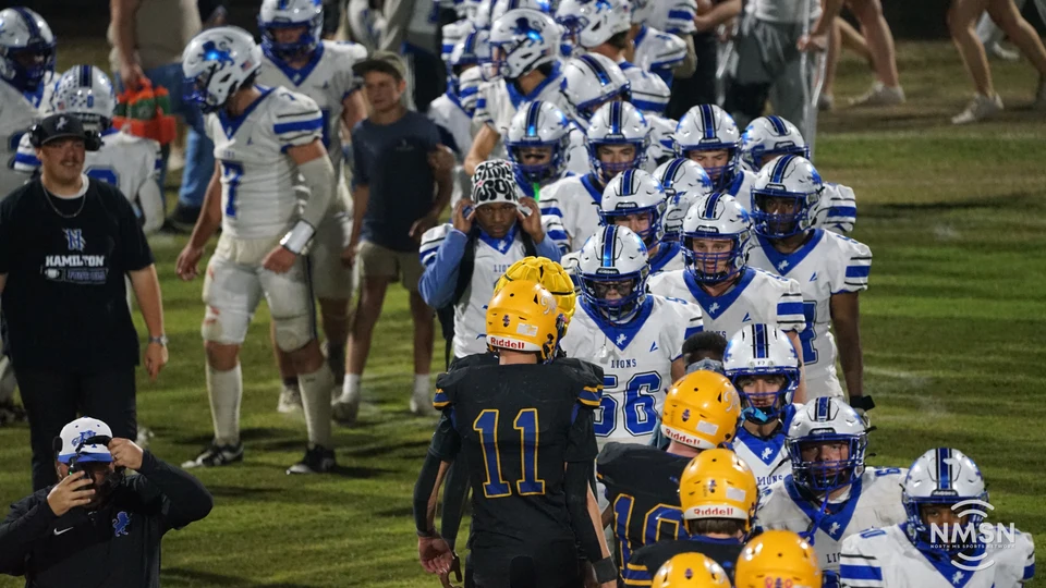 Hamilton and Hatley meet in the postgame handshake line — Hamilton at Hatley, October 30, 2026. Photo: NMSN.