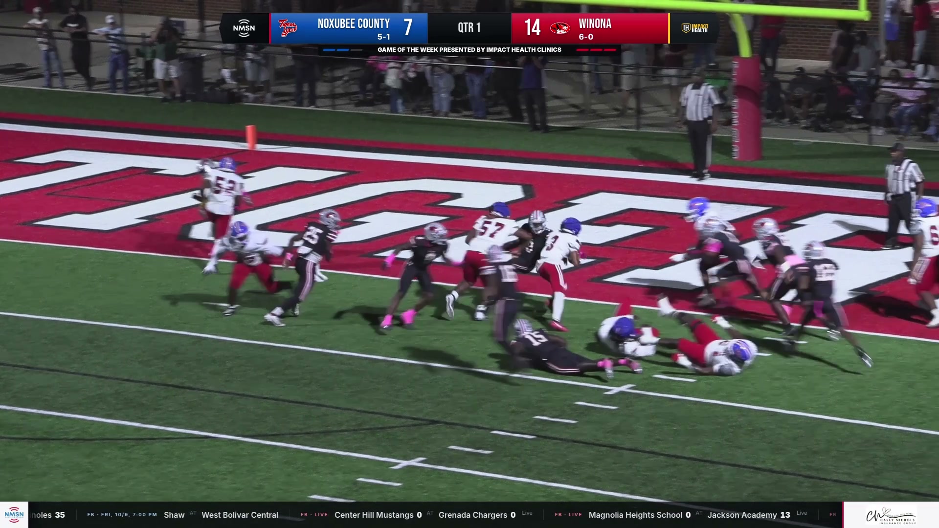 Noxubee County pushes into the end zone during the first half at Winona. Frame from the October 9 NMSN broadcast.